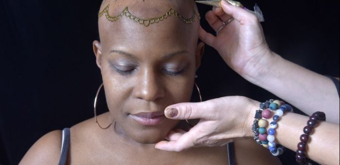 Annapolis-area artist paints over mastectomy scars, bald heads from chemo